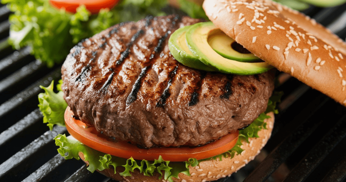 Delicious and healthy lean beef patties sizzling on the grill